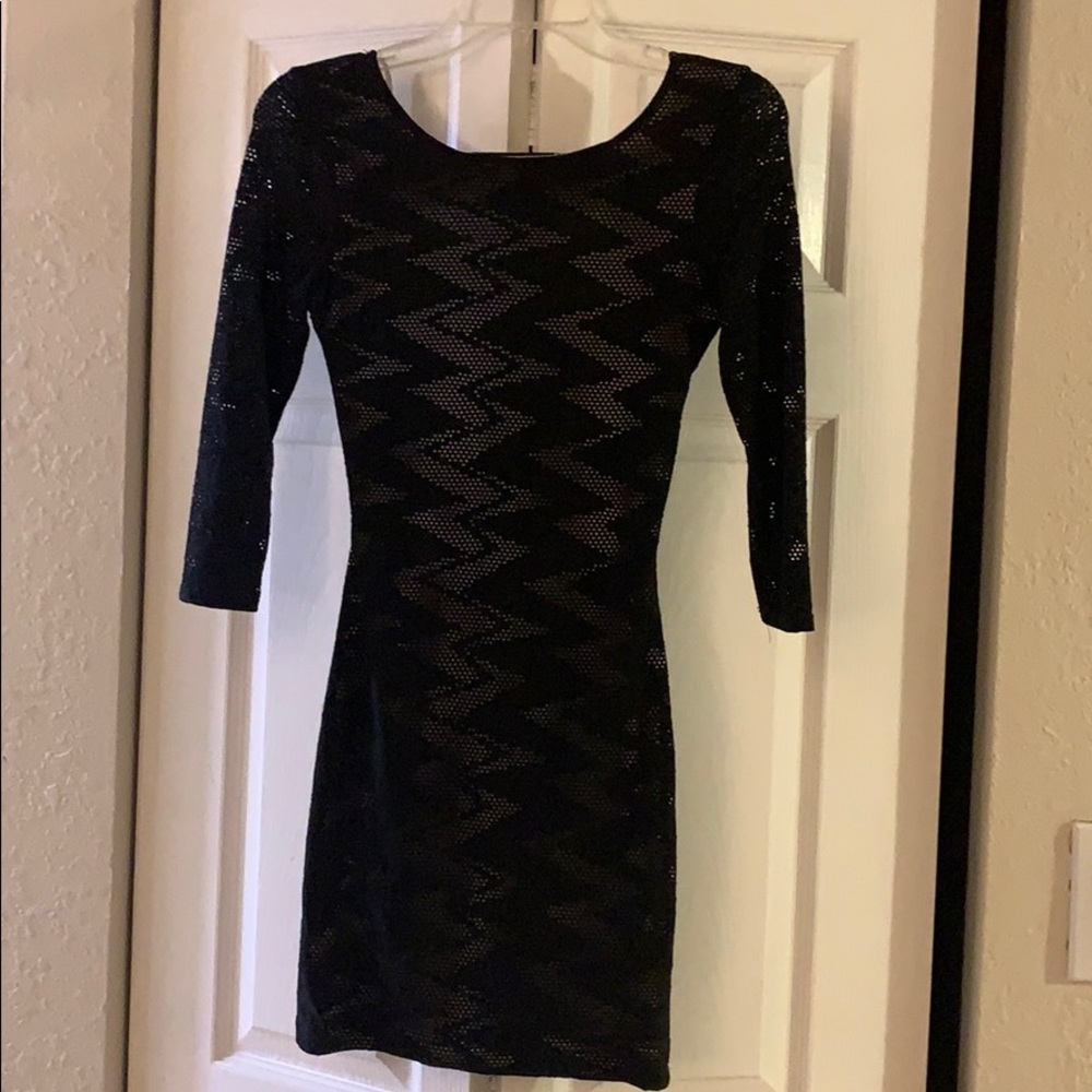 Black mini dress with open back